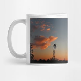 Kansas Sunset with a Windmill Silhouette and clouds Mug